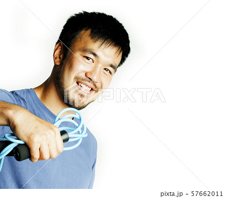 young asian man holding skipping rope isolated on white background, lifestyle sport people concept 57662011