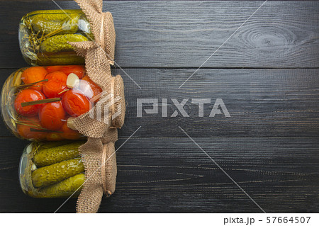Canned vegetables cucumber and tomato. 57664507