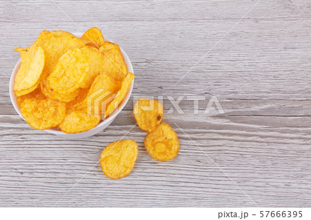 Potato chips in bowl Potato chips in bowl 57666395