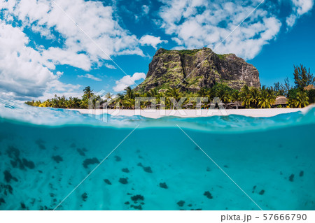 Tropical crystal ocean with Le Morne mountain and luxury beach in Mauritius. Split view. 57666790