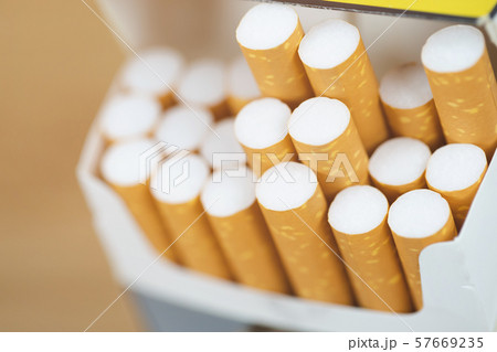 Man is picking Cigarette from Package Man is picking Cigarette from Package 57669235