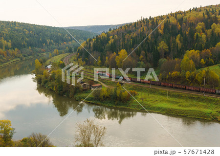 landscape autumn river valley between the hills 57671428