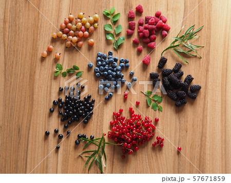 summer berries on a wooden table summer berries on a wooden table 57671859