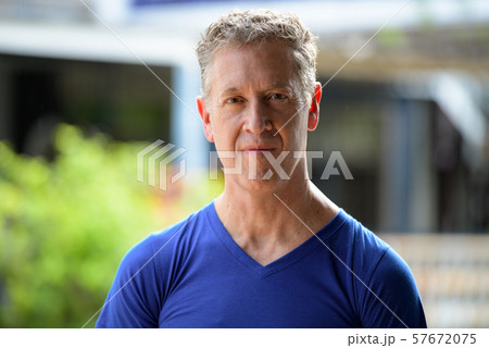 Face of mature man in the streets outdoors 57672075