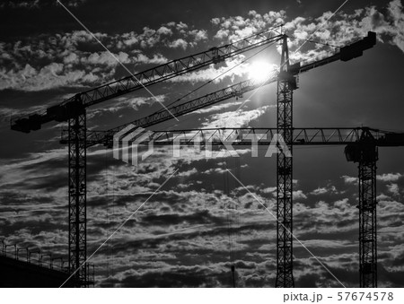 Cranes on a construction site Cranes on a construction site 57674578