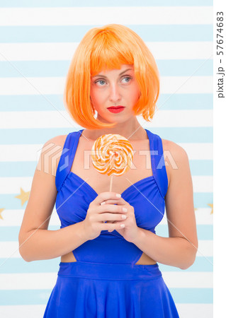 happy pinup model with lollipop in hand. Crazy happy pinup model with lollipop in hand. Crazy 57674683