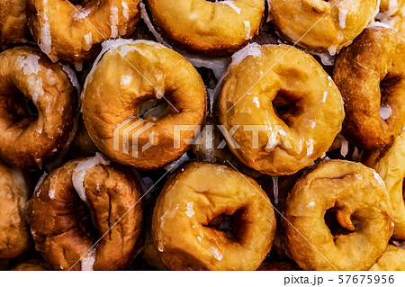 Many sweet donuts pyramid folded. texture donuts Many sweet donuts pyramid folded. texture donuts 57675956