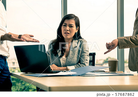 Managing Director and Manager Claiming to Businesswoman At Office 57687862