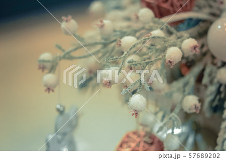 Christmas tree toys decorations and snow-covered Christmas tree branche close-up Christmas tree toys decorations and snow-covered Christmas tree branche close-up 57689202