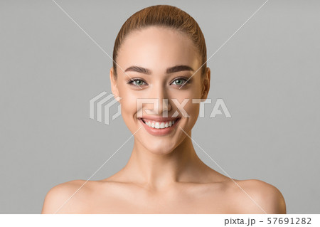 Beauty portrait. Beautiful woman with perfect smile 57691282