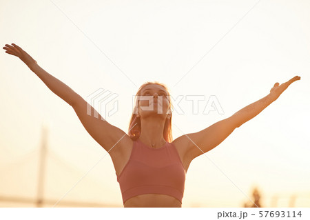 Young woman enjoying the nature Young woman enjoying the nature 57693114