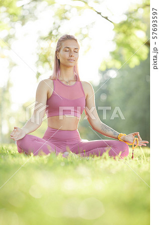 Woman concentrating on her breath 57693597