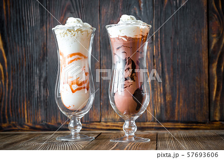 Two glasses of milkshake Two glasses of milkshake 57693606