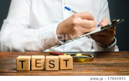 Word test and a man with a clipboard in the background. Organization, review. Pass inspection, permission for the business. Driving license. Quality control, audit. The inspector conducts a check. 57693955