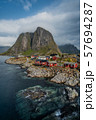 View of Hamnoy or Hamnoya, a small fishing village in Moskenes Municipality on Lofoten islands in Nordland county, Norway from the photo spot on the bridge nearby 57694287