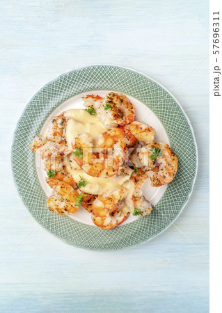 Shrimps with a white sauce, shot from above with copy space Shrimps with a white sauce, shot from above with copy space 57696311