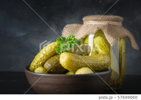 Canned vegetables cucumber in bowl. Close up. 57699060