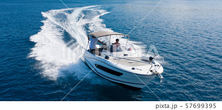 High speed motor boat on open sea. High speed motor boat on open sea. 57699395