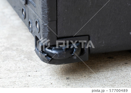 Damaged rubber bearing luggage wheel 57700489