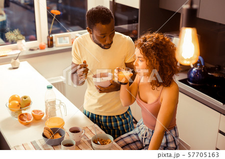 Emotional dark-skinned male person talking to his partner 57705163