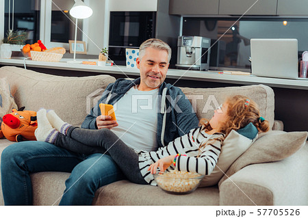 Happy male person communicating with his child Happy male person communicating with his child 57705526