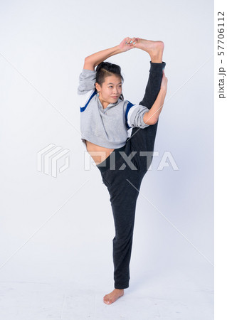Full body shot of beautiful Asian woman stretching and ready for gym 57706112