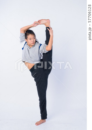 Full body shot of beautiful Asian woman stretching and ready for gym 57706128