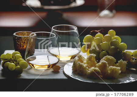 Cheese, grapes and wine 57706289
