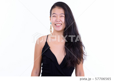 Portrait of happy beautiful Asian woman thinking ready to party Portrait of happy beautiful Asian woman thinking ready to party 57706565