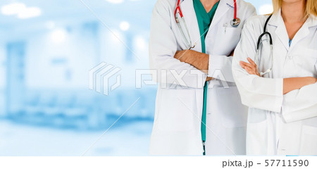 Doctors working with colleague in the hospital. 57711590