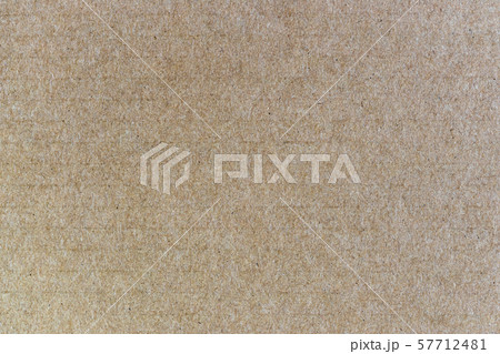 Brown background from sheet of recycled cardboard. Close up detail view of abstract texture 57712481