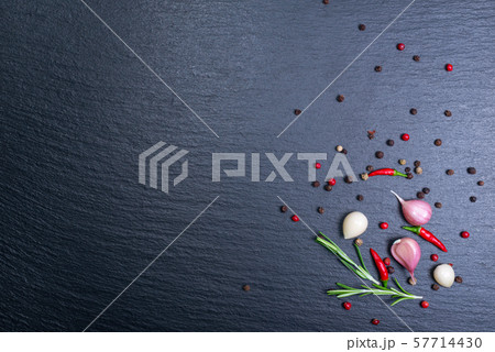 top view of chili and dry pepper, garlic, rosemary top view of chili and dry pepper, garlic, rosemary 57714430