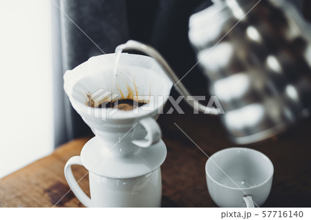 Drip coffee on the desk at home Drip coffee on the desk at home 57716140