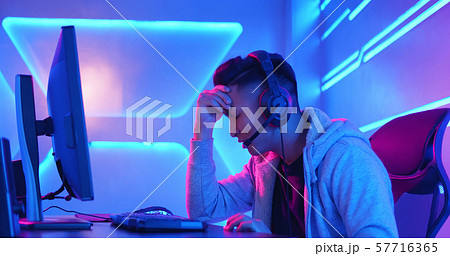 Young Asian cyber sport gamer 57716365