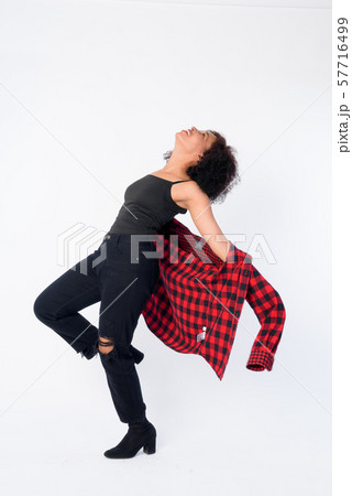 Full body shot of happy young beautiful African hipster woman posing Full body shot of happy young beautiful African hipster woman posing 57716499