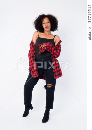 Full body shot of young beautiful African hipster woman Full body shot of young beautiful African hipster woman 57716512