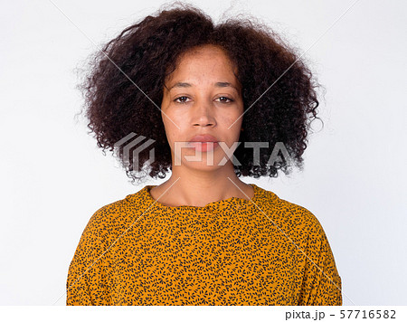 Face of young beautiful African woman looking at camera 57716582