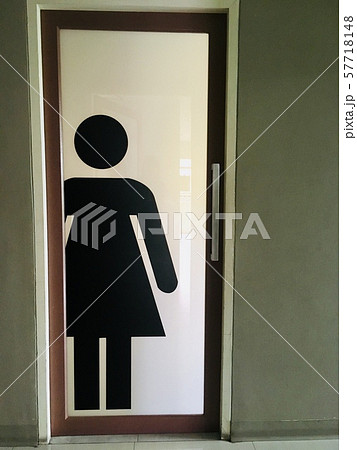 Women Restroom symbol on the door, female sign for rest room Women Restroom symbol on the door, female sign for rest room 57718148