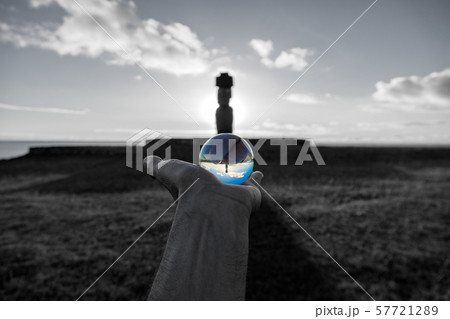 Backlit of Moai with Pukao in Rapa Nui through crystal ball Backlit of Moai with Pukao in Rapa Nui through crystal ball 57721289