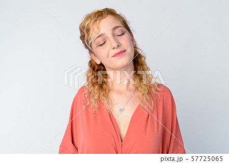 Face of beautiful blonde woman relaxing with eyes closed 57725065