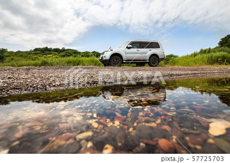 Silver SUV at sea coast 57725703
