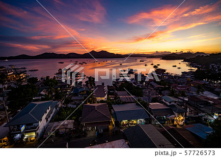 Panoramic view of a sunset over the city of Coron, Philippines Panoramic view of a sunset over the city of Coron, Philippines 57726573