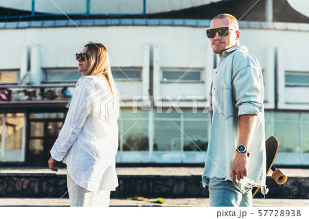 Tanned young caucasian couple, modern lovestory in film grain effect Tanned young caucasian couple, modern lovestory in film grain effect 57728938
