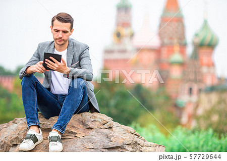 Happy young urban man in european city. Happy young urban man in european city. 57729644