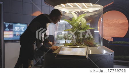 Scientists and robot working in lab Scientists and robot working in lab 57729796