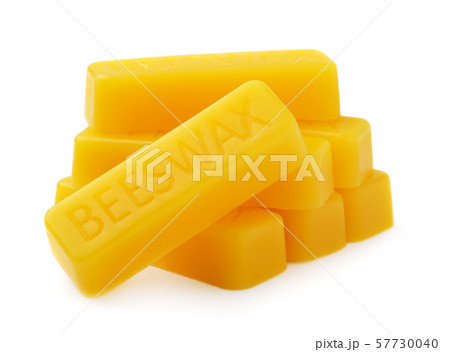Bars of natural beeswax are isolated on a white background. Beekeeping products. Natural yellow 57730040