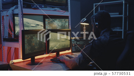 Soldiers controlling rocket launch on computer Soldiers controlling rocket launch on computer 57730531