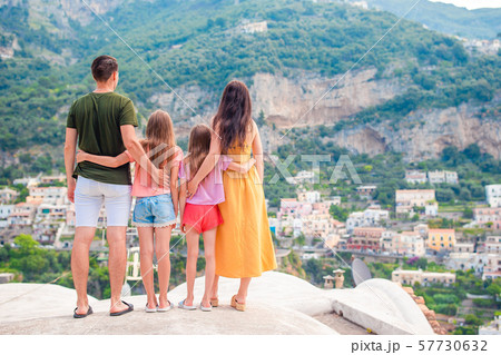 Summer holiday in Italy. Young woman in Positano village on the background, Amalfi Coast, Italy 57730632