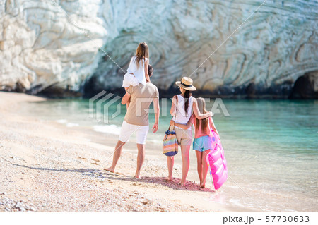 Happy beautiful family with kids on the beach 57730633