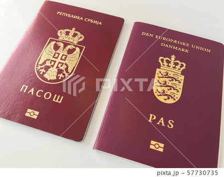 Serbian and Danish Passports on the white background 57730735